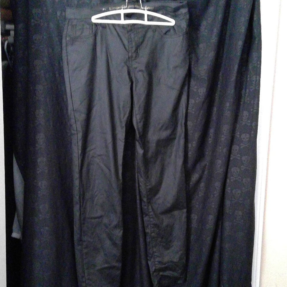 Faux-leather; coated black skinny jeans